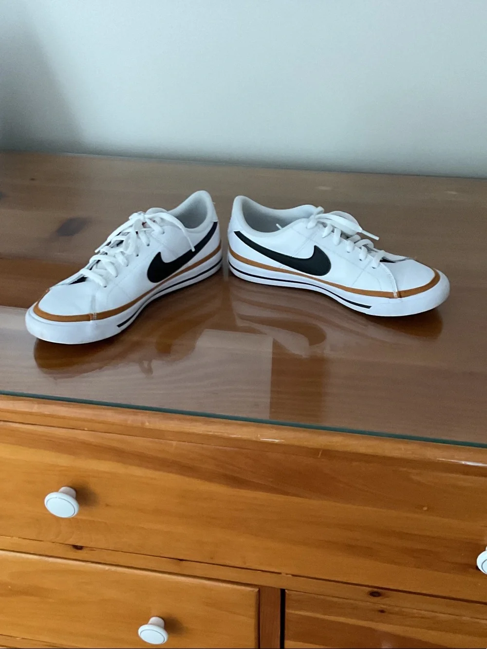 Nike White Leather Sneakers with Black Swoosh and Tan Trim